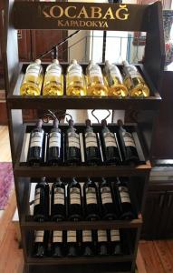 a bunch of bottles of wine in a refrigerator at Hotel SultanHill in Istanbul