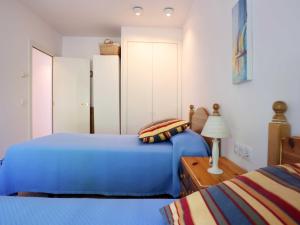 Posteľ alebo postele v izbe v ubytovaní Duplex Vall d'aro F32076