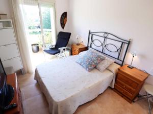 Posteľ alebo postele v izbe v ubytovaní Duplex Vall d'aro F32076