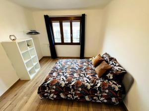 מיטה או מיטות בחדר ב-Appartement aux portes du Verdon
