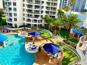 an image of a pool at a resort at Beachfront Romantic Getaway - Surfers Paradise in Gold Coast