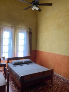 Hostel Iguana Azul tesisinde bir odada yatak veya yataklar