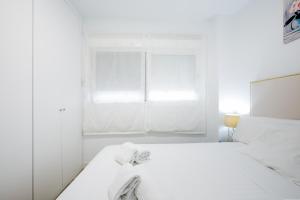 Posteľ alebo postele v izbe v ubytovaní 1 9 Tesoro Galeon Spa y Gym