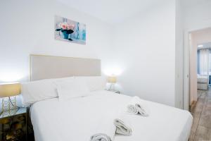 Posteľ alebo postele v izbe v ubytovaní 1 9 Tesoro Galeon Spa y Gym