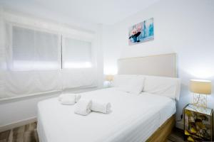 Posteľ alebo postele v izbe v ubytovaní 1 9 Tesoro Galeon Spa y Gym