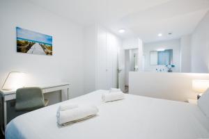 Posteľ alebo postele v izbe v ubytovaní 1 9 Tesoro Galeon Spa y Gym