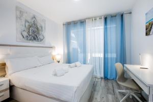 Posteľ alebo postele v izbe v ubytovaní 1 9 Tesoro Galeon Spa y Gym