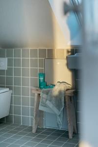 Kúpeľňa v ubytovaní Le Duplex de Maison Passage
