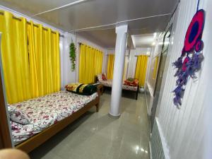 Postel nebo postele na pokoji v ubytování Kalimpong View Homestay