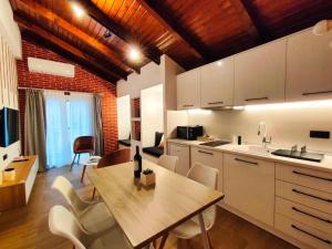 Η κουζίνα ή μικρή κουζίνα στο Centro Urban Suites