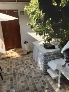 Zahrada ubytování Studio apartman Tomi - seaview
