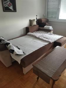 Krevet ili kreveti u jedinici u objektu Confluence Apartment