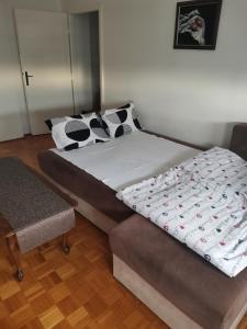 Krevet ili kreveti u jedinici u objektu Confluence Apartment