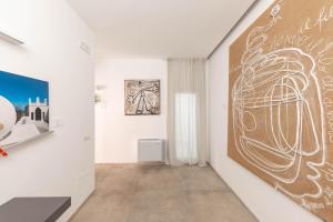 Fotografie z fotogalerie ubytování Palazzo Novecento v destinaci Polignano a Mare