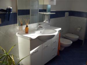a bathroom with a sink and a toilet at Casa Mia in Florence +29 photos