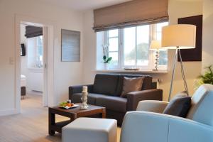 Posezení v ubytování Rackmers Hof - Suiten Hotel garni mit Sauna