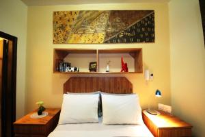 Postel nebo postele na pokoji v ubytování OKE Apart Hotel