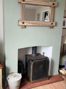 Et tv og/eller underholdning på Turning Tides Holiday Cottage