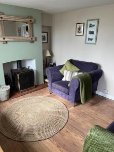 Et opholdsområde på Turning Tides Holiday Cottage