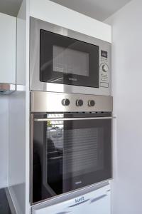 Kuchyň nebo kuchyňský kout v ubytování Amazing spacious 1 bedroom flat with Ocean view, 311, Ponderosa