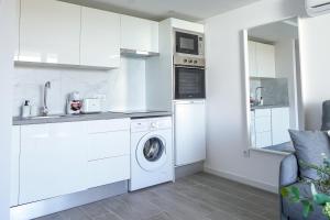 Kuchyň nebo kuchyňský kout v ubytování Amazing spacious 1 bedroom flat with Ocean view, 311, Ponderosa