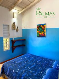 Cama o camas de una habitación en Villa Las Palmas