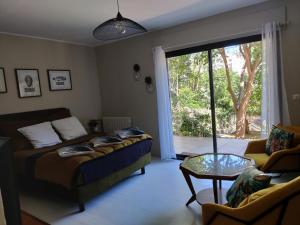 Posedenie v ubytovaní Chambre d'hôtes Les terrasses de Saint Clair