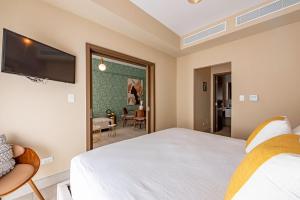 Voodi või voodid majutusasutuse Brickell Apart Hotel toas