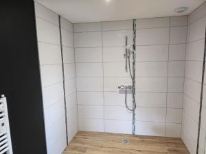 Kúpeľňa v ubytovaní Chambres Jura Sud