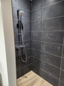 Kúpeľňa v ubytovaní Chambres Jura Sud