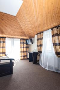 Postel nebo postele na pokoji v ubytování Готель Скіфія