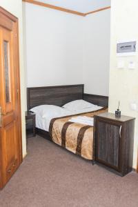 Postel nebo postele na pokoji v ubytování Готель Скіфія