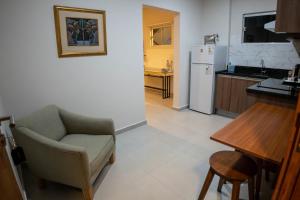 Кухня або міні-кухня у VIVARIUM APART HOTEL