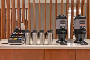 a coffee machine sitting on top of a counter at SpringHill Suites by Marriott Albuquerque University Area in Albuquerque