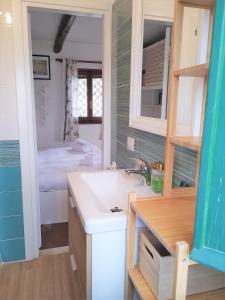 A bed or beds in a room at In the Clouds over Trastevere, penthouse studio