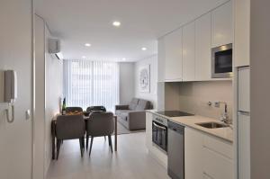 Dapur atau dapur kecil di Sé Apartamentos - Luxury Apartment