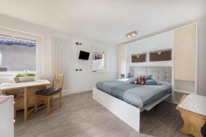 Postel nebo postele na pokoji v ubytování CASA PARE' B&B