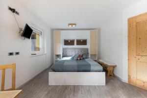 Postel nebo postele na pokoji v ubytování CASA PARE' B&B