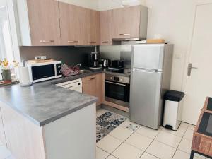 Kuchyň nebo kuchyňský kout v ubytování Charmante maison au calme + 5 fotografií