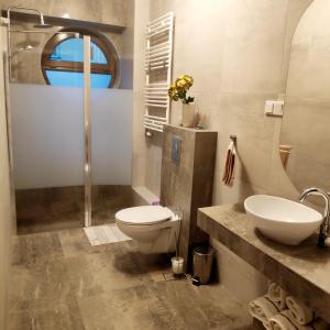 Kúpeľňa v ubytovaní Apartament HELLADA