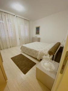 Ένα ή περισσότερα κρεβάτια σε δωμάτιο στο GORGEOUS APARTMENT IN SAN MARCO