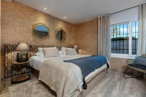 Posteľ alebo postele v izbe v ubytovaní Super Stylish apartment in La Alcazaba - RDR172