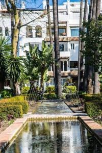 Vonkajšia záhrada v ubytovaní Super Stylish apartment in La Alcazaba - RDR172