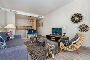 Televízia a/alebo spoločenská miestnosť v ubytovaní Super Stylish apartment in La Alcazaba - RDR172