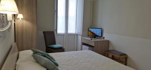 TV a/nebo společenská místnost v ubytování DIAZ Rooms