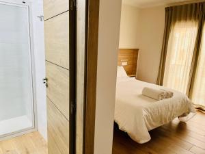 Postel nebo postele na pokoji v ubytování El Montoro