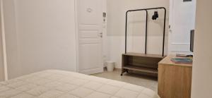 Postel nebo postele na pokoji v ubytování DIAZ Rooms