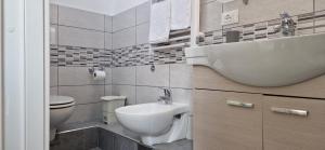 Koupelna v ubytování DIAZ Rooms