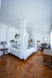 Ένα ή περισσότερα κρεβάτια σε δωμάτιο στο finca dos Mares