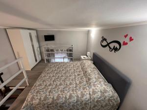 Ένα ή περισσότερα κρεβάτια σε δωμάτιο στο SWEET Home Lingotto +25 φωτογραφίες